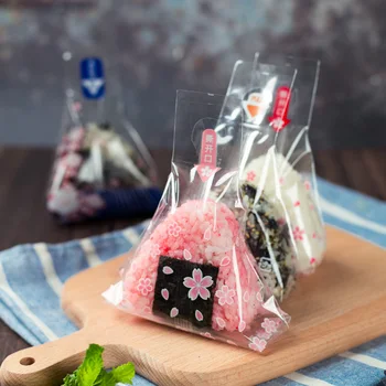 100 adet Japon tarzı üçgen pirinç topu ambalaj çanta Yosun hediye çantası Suşi Kalıp Japon Mutfağı Yapma Araçları Bento Aksesuarları